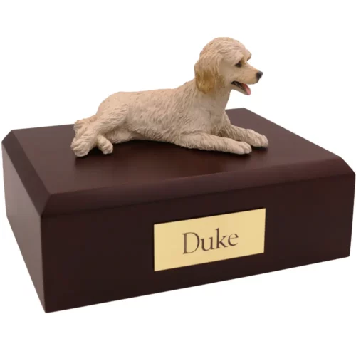 Cream labradoodle dog figurine on wood memorial pet cremation urn