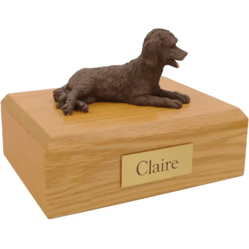 Chocolate labradoodle dog figurine on wood memorial pet cremation urn