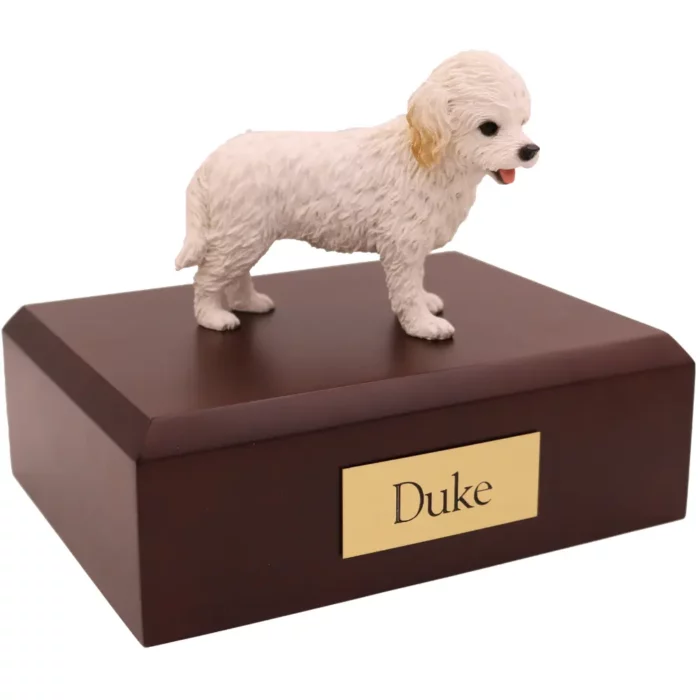 Standing white cockapoo dog figurine on wood memorial pet cremation urn