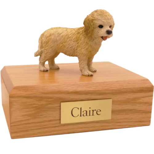 Standing blonde cockapoo dog figurine on wood memorial pet cremation urn