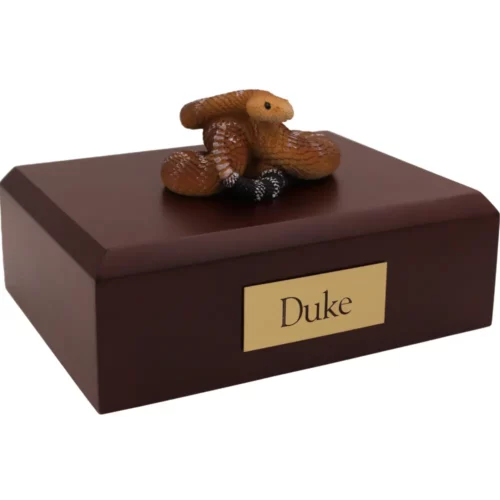 Rattlesnake figurine on wood memorial pet cremation urn