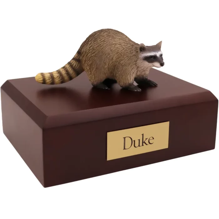 Raccoon figurine on wood memorial pet cremation urn