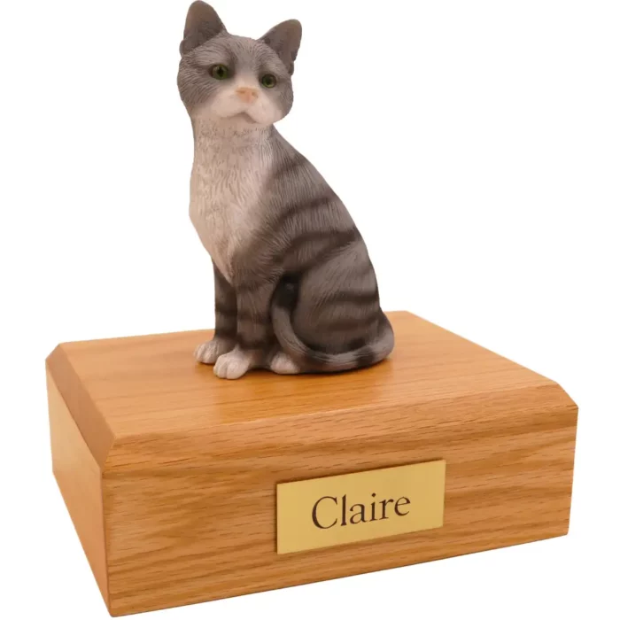 Sitting gray & white cat figurine on wood memorial pet cremation urn