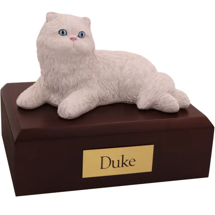 Laying white persian cat figurine on wood memorial pet cremation urn