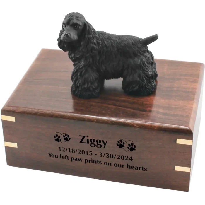 Black cocker spaniel dog figurine on wood cremation urn, engraved wood, black fill