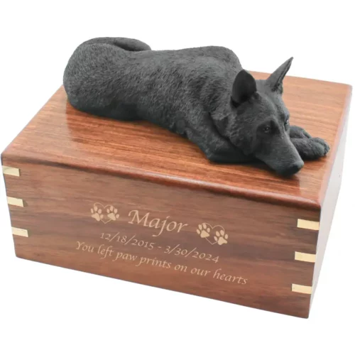 Black german shepherd figurine on wood cremation urn, with engraved wood, gold fill