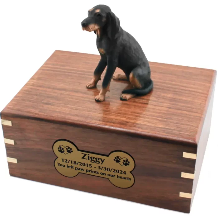 Black & tan coonhound dog figurine on wood cremation urn, engraved plate