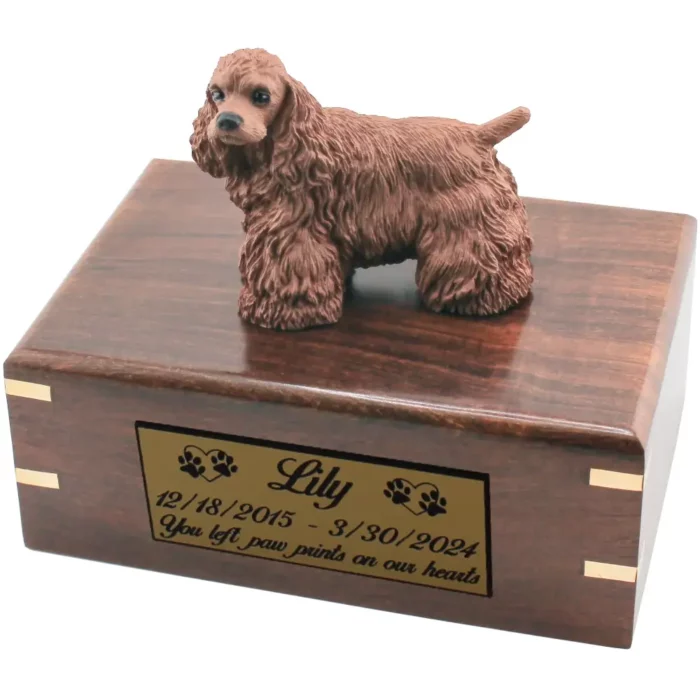 Brown cocker spaniel dog figurine on wood cremation urn, engraved plate