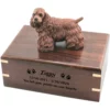 Brown cocker spaniel dog figurine on wood cremation urn, engraved wood, black fill