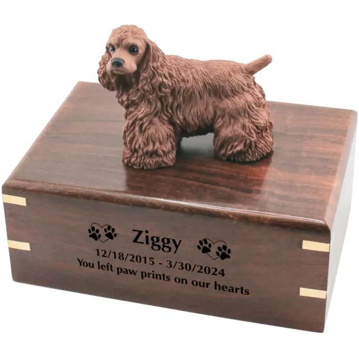 Brown cocker spaniel dog figurine on wood cremation urn, engraved wood, black fill