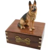 Sitting german shepherd dog figurine on wood cremation urn, engraved plate