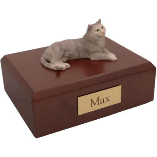 Laying gray tabby cat figurine on wood memorial cremation urn