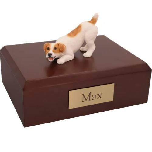 Playful tan white jack russell terrier dog figurine on wood memorial cremation urn