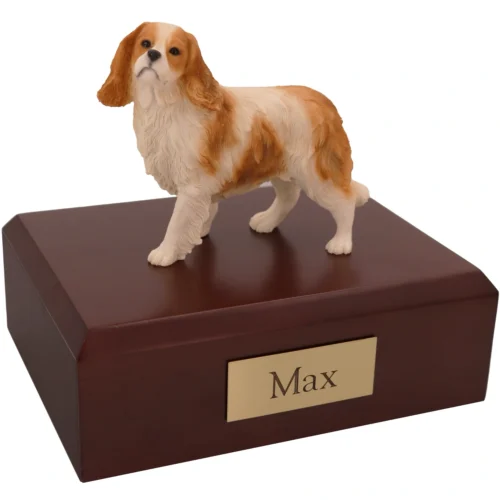 Standing brown white king charles spaniel dog figurine on wood memorial cremation urn