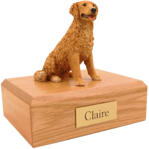 Golden retriever dog figurine on wood memorial cremation urn