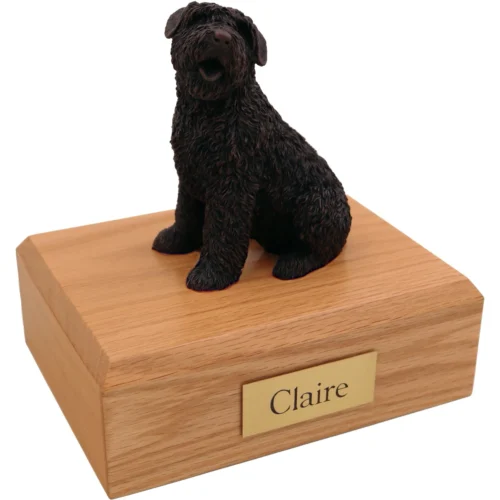 Sitting bouvier bronze look dog figurine on wood cremation urn