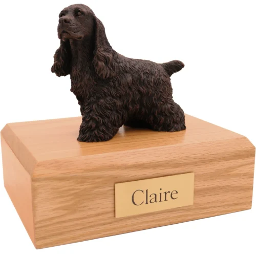 Standing cocker spaniel bronze look dog figurine on wood cremation urn
