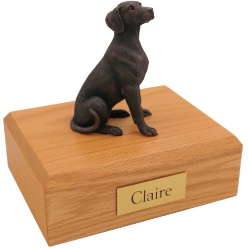 Sitting dalmatian bronze look dog figurine on wood cremation urn