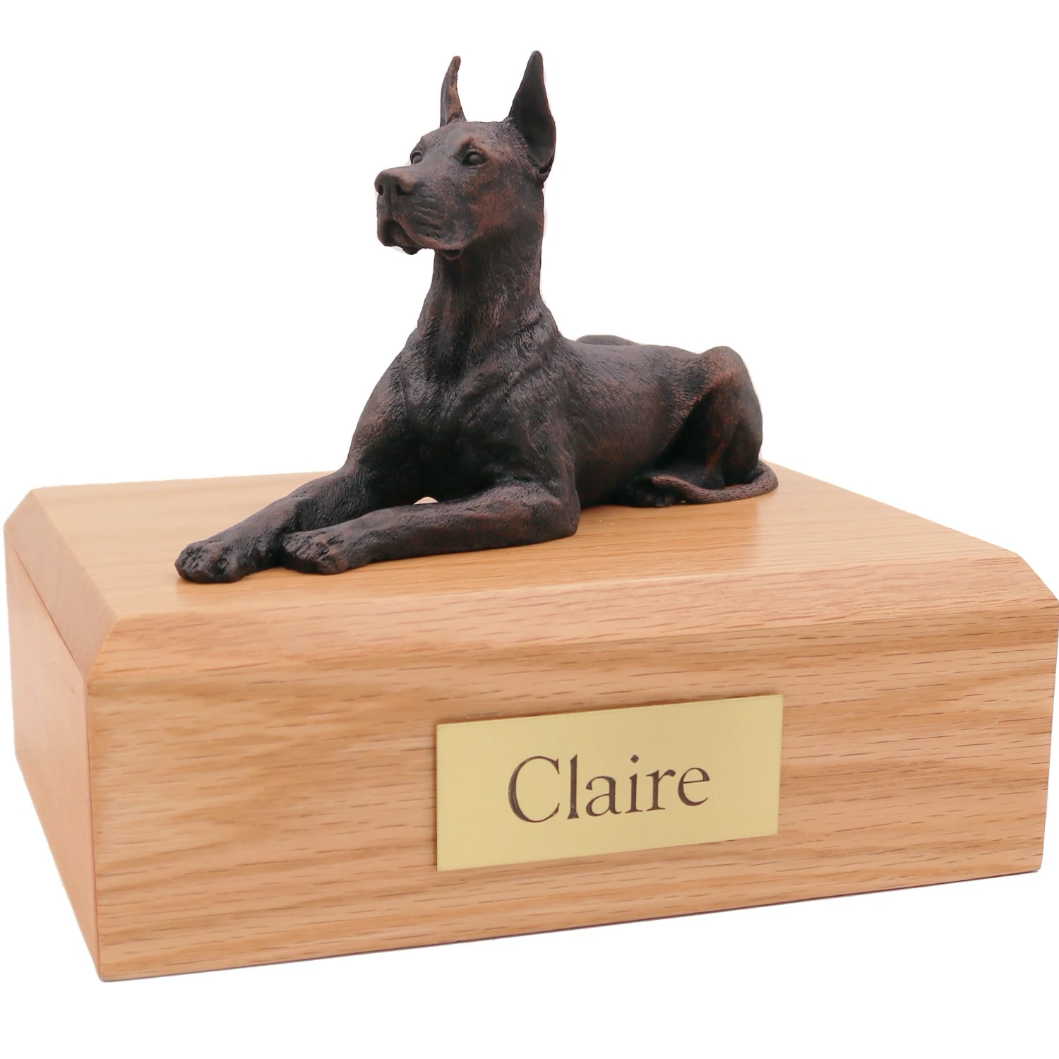 Laying great dane ears up bronze look dog figurine on wood cremation urn