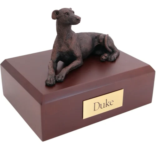 Laying greyhound (whippet) bronze look dog figurine on wood cremation urn