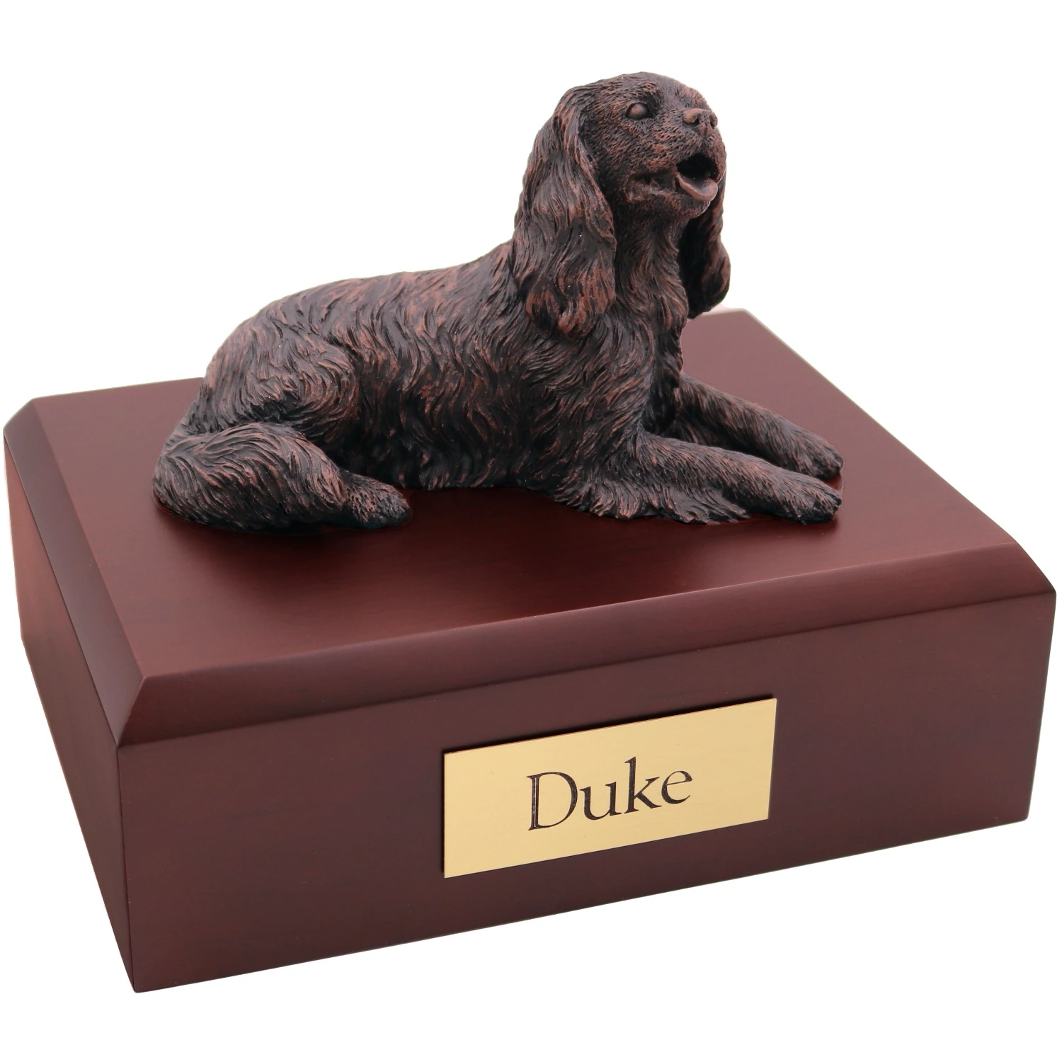 Laying king charles spaniel bronze look dog figurine on wood cremation urn
