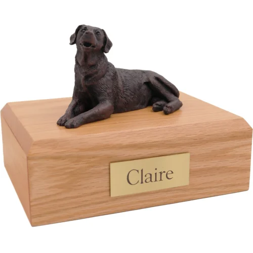 Laying labrador bronze look dog figurine on wood cremation urn