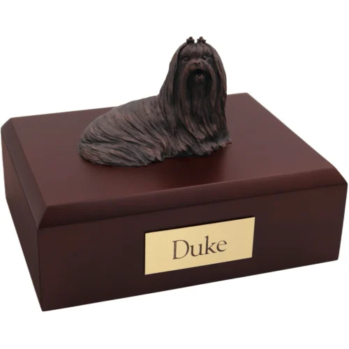 Laying maltese bronze look dog figurine on wood cremation urn