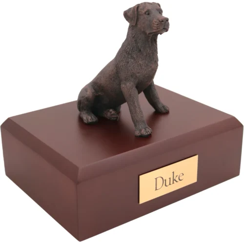 Sitting rottweiler bronze look dog figurine on wood cremation urn
