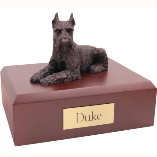 Laying ears up schnauzer bronze look dog figurine on wood cremation urn