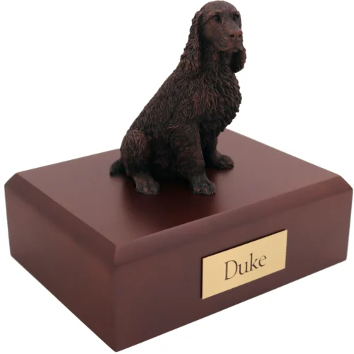 Sitting springer spaniel bronze look dog figurine on wood cremation urn