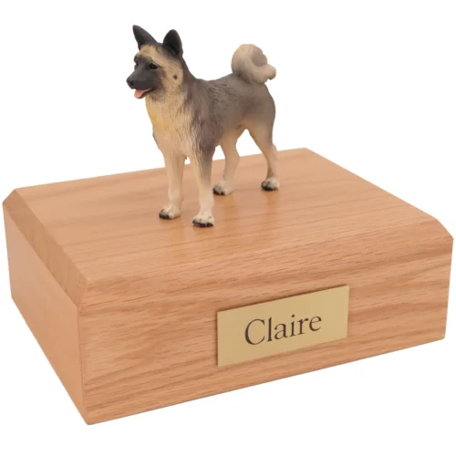 Standing gray Akita dog figurine on wood cremation urn