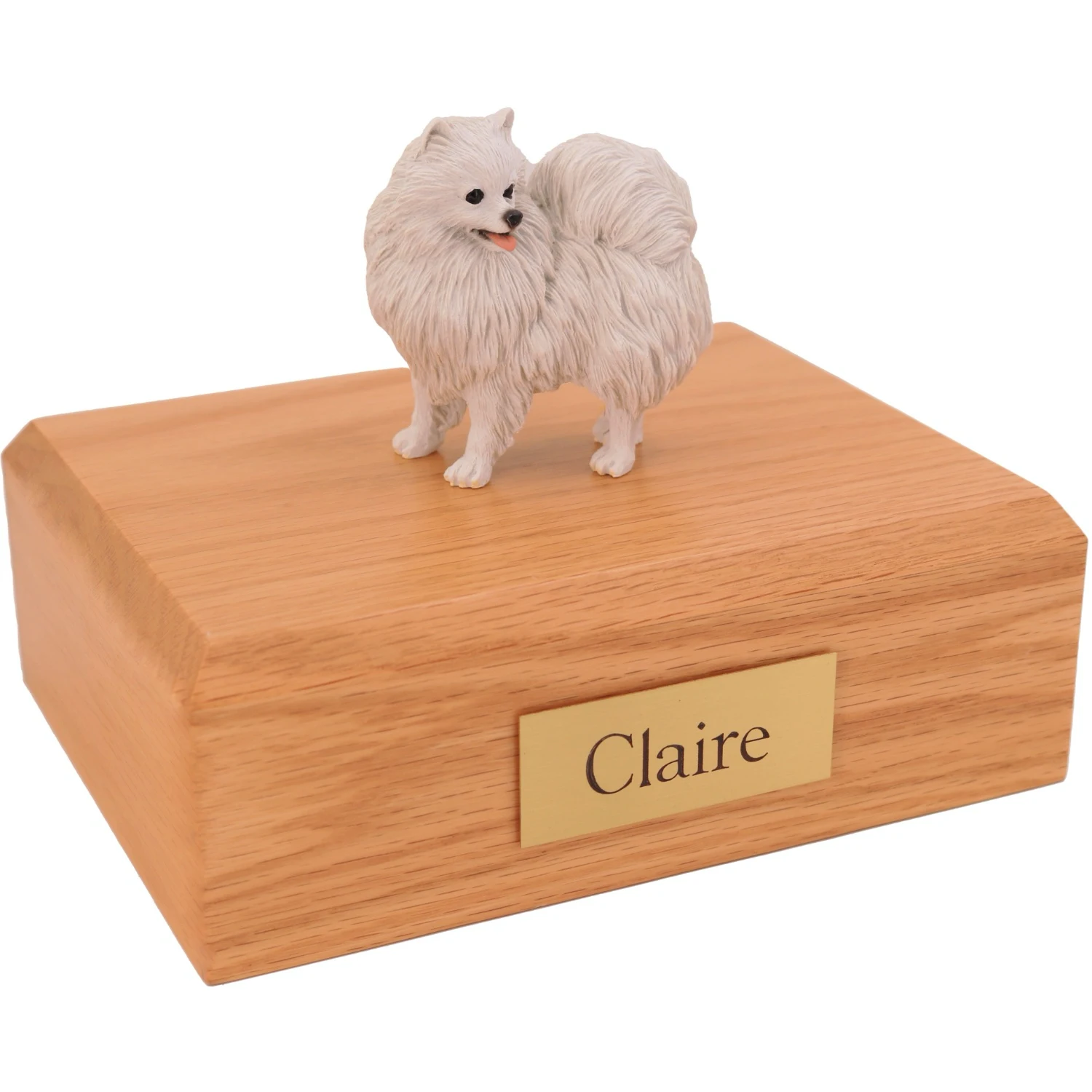 Standing miniature American Eskimo dog figurine on wood cremation urn