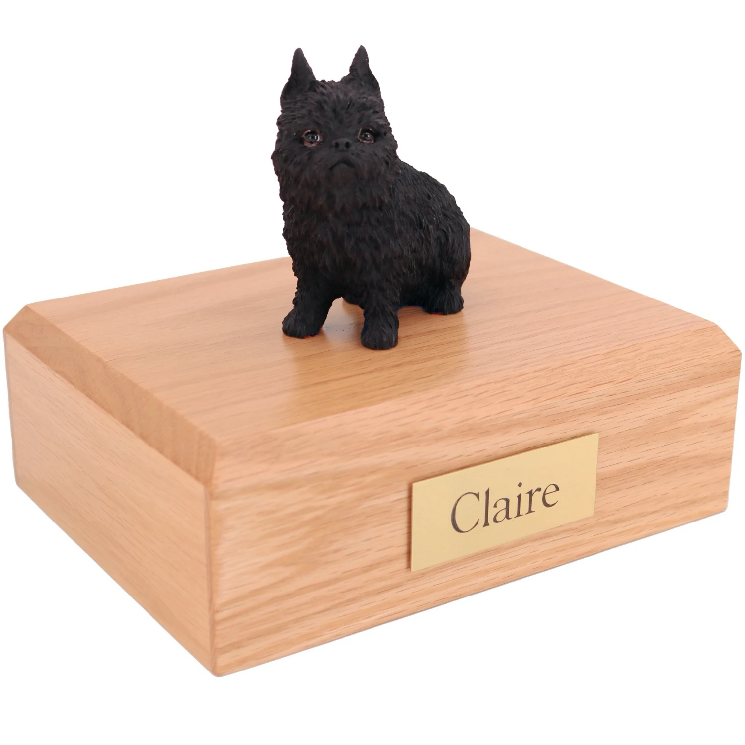 sitting black brussels griffon dog figurine on wood cremation urn