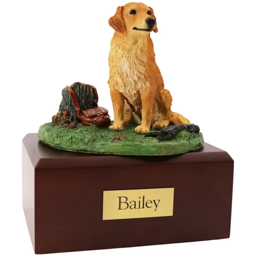 Sitting golden retriever dog figurine with wooden stump on cremation urn