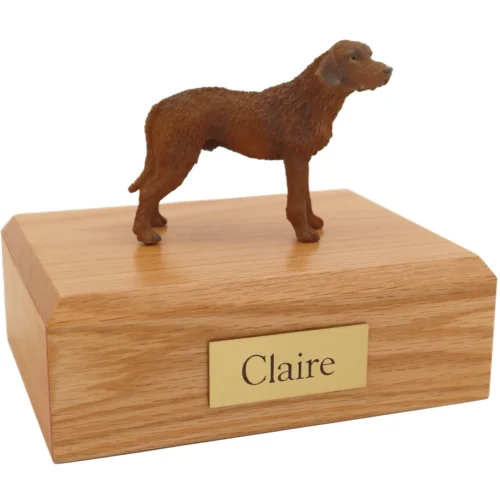 Standing Chesapeake Bay Retriever dog figurine on wood cremation urn