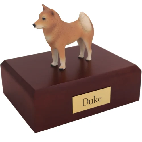 Standing Finnish spitz dog figurine on wood cremation urn