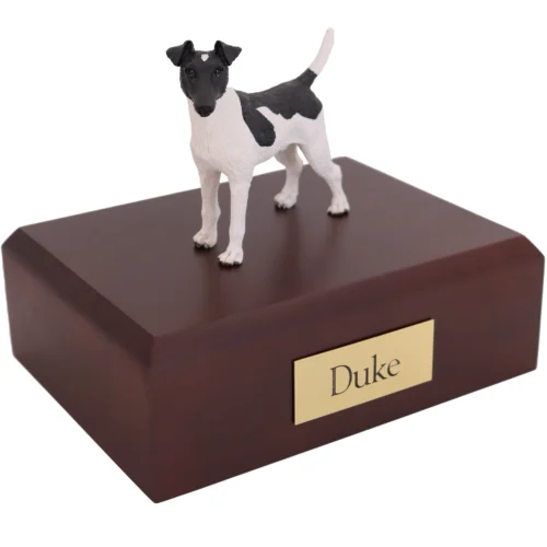 Standing black and white smooth fox terrier dog figurine on wood cremation urn
