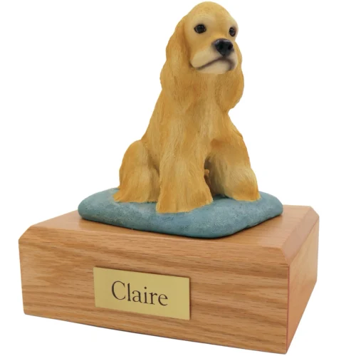 Blonde Cocker Spaniel dog figurine on wood cremation urn