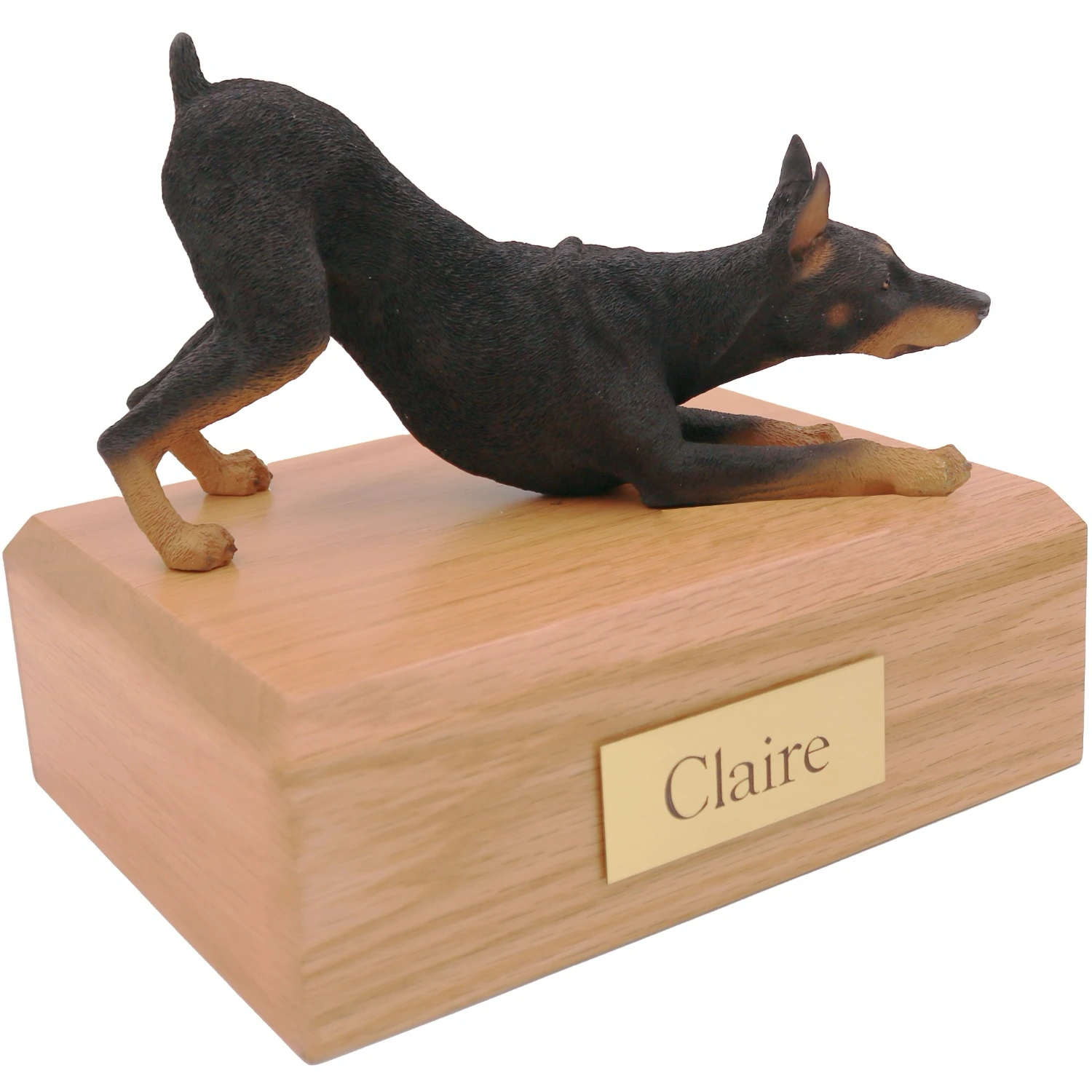 Black ears up Doberman Pinscher dog figurine on wood cremation urn