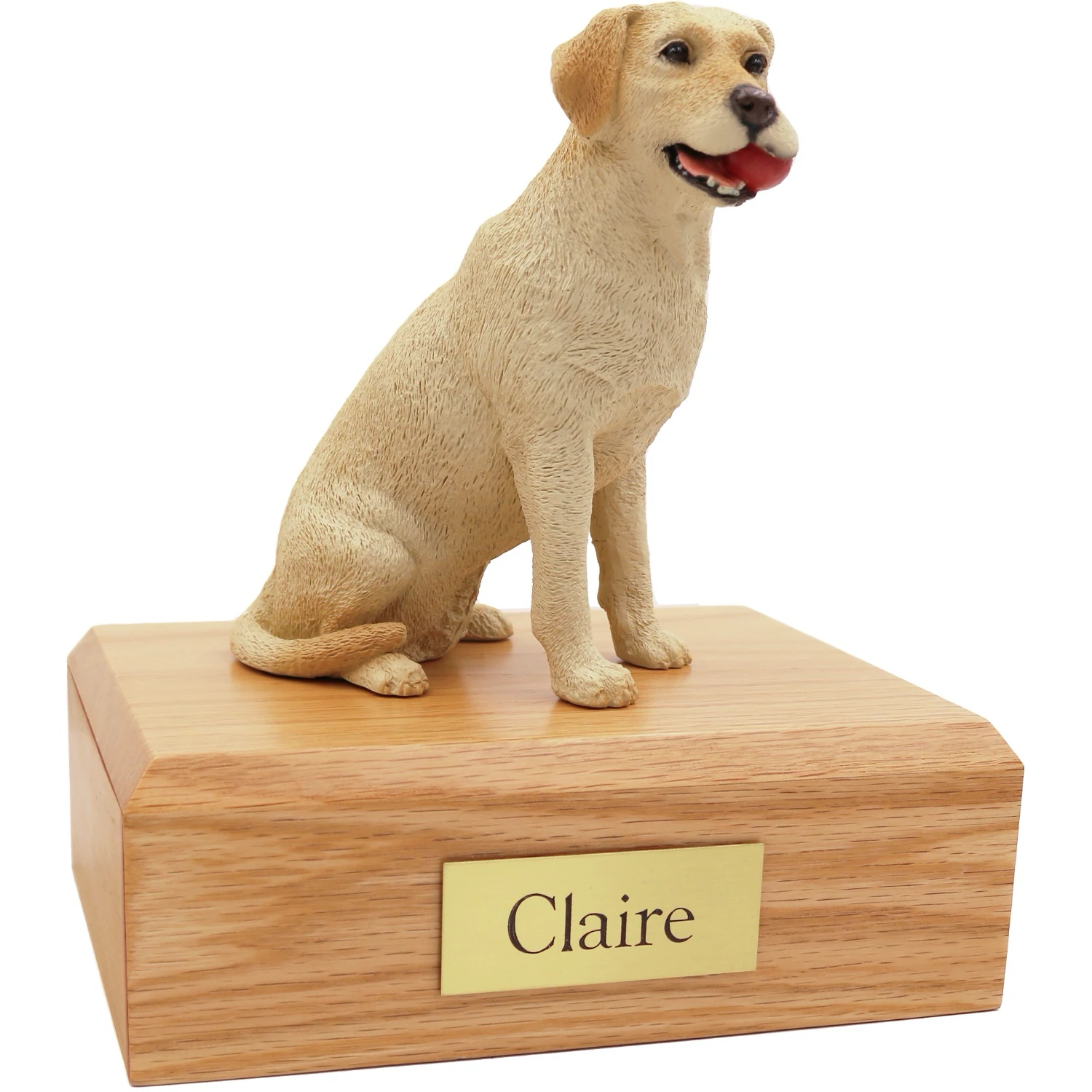 Yellow Labrador Retriever with ball dog figurine on wood cremation urn