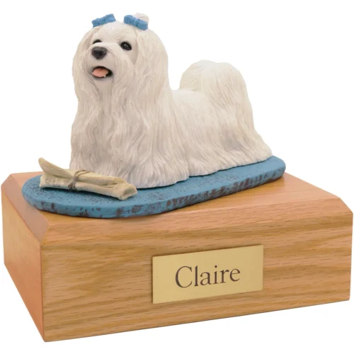 Maltese dog figurine on wood cremation urn