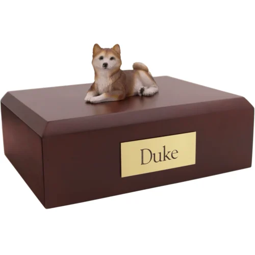 Red white Husky dog figurine on wood cremation urn
