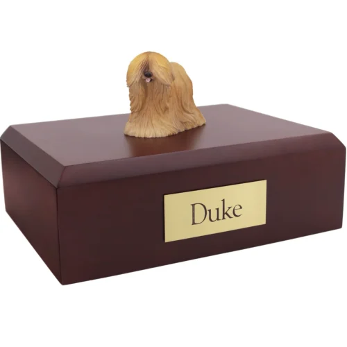 Lhasa Apso dog figurine on wood cremation urn
