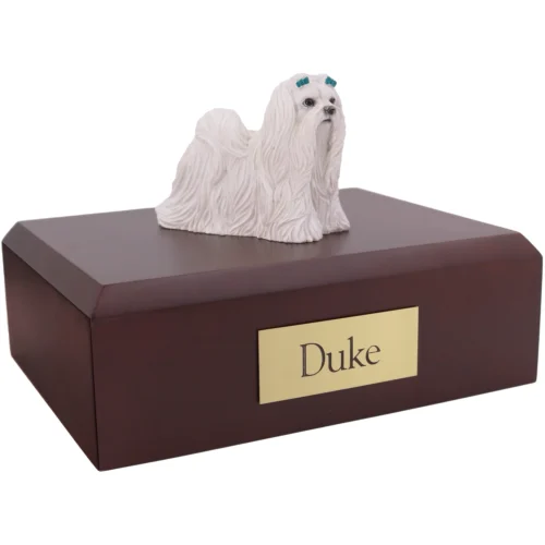 Maltese dog figurine on wood cremation urn