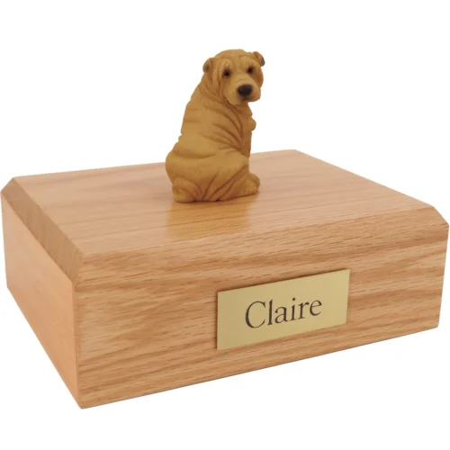 Tan Shar Pei dog figurine on wood cremation urn