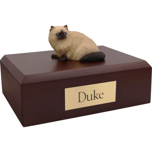 Himalayan cat figurine on wood cremation urn