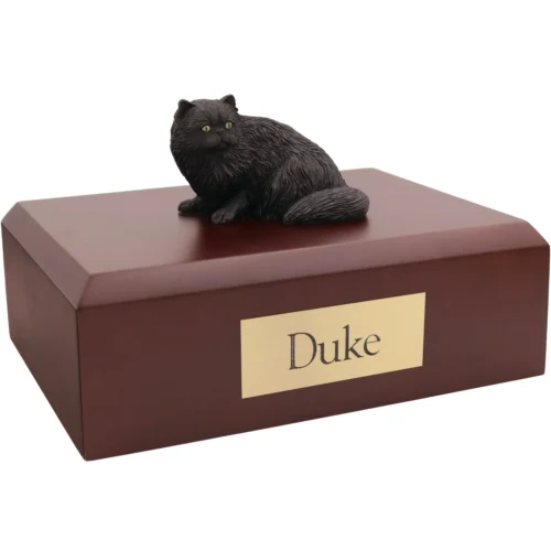 Black Persian cat figurine on wood cremation urn