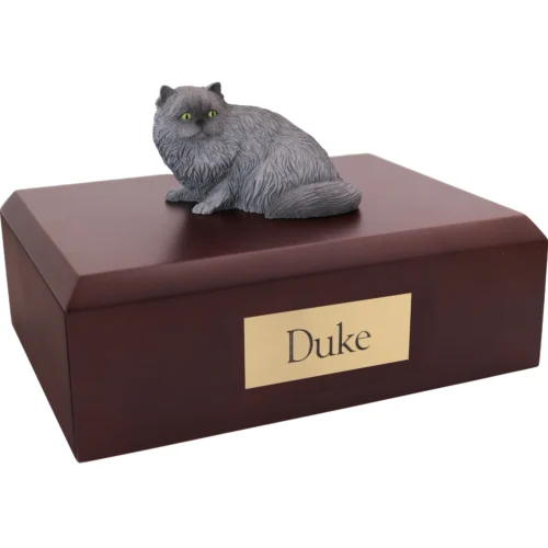Gray Persian cat figurine on wood cremation urn
