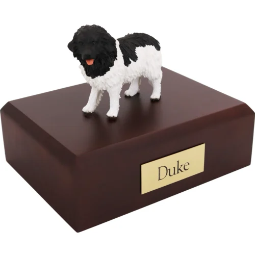 Standing Landseer dog figurine on wood cremation urn
