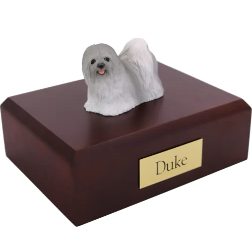 Standing gray lhasa apso dog figurine on wood cremation urn